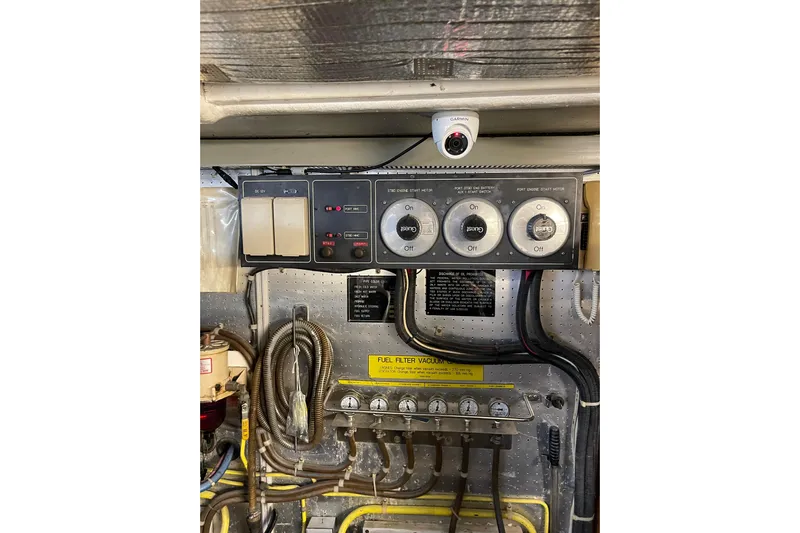 "fortunate" Yacht Photos Pics Control panel and wiring inside a 1995 JOHNSON 65 Flybridge Motoryacht engine room.