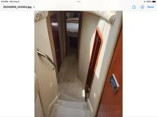  Yacht Photos Pics Stairway inside 2004 Sea Ray 480 Sedan Bridge yacht, leading to cabin area.