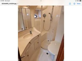  Yacht Photos Pics 2004 Sea Ray 480 Sedan Bridge bathroom with shower, sink, and toilet.