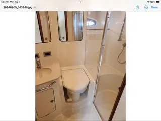  Yacht Photos Pics Luxurious bathroom in 2004 Sea Ray 480 Sedan Bridge yacht with shower and vanity.