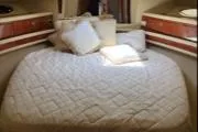  Yacht Photos Pics Luxurious bedroom interior of 2004 Sea Ray 480 Sedan Bridge yacht.