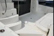  Yacht Photos Pics 2004 Sea Ray 480 Sedan Bridge yacht interior with white seating and steps.