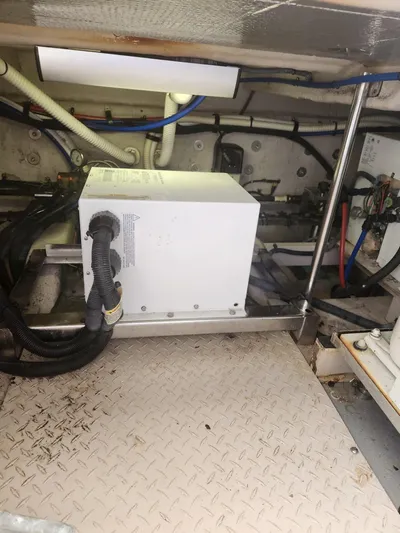  Yacht Photos Pics Engine room of 2004 Sea Ray 480 Sedan Bridge with visible wiring and equipment.