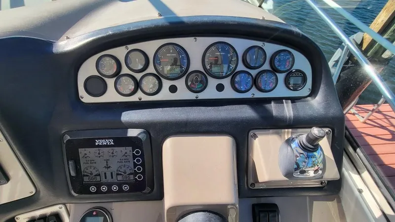 Little Wing Yacht Photos Pics Dashboard of a 2008 Cruisers 420 Express boat with gauges and controls.