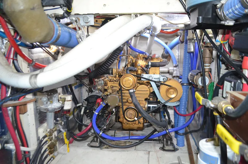 Drakus Yacht Photos Pics Engine room of a 1973 Skookum Ketch with visible mechanical components and wiring.