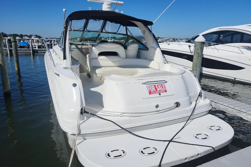 Yacht Photos Pics 2002 Sea Ray 410 Sundancer yacht for sale, docked at marina.