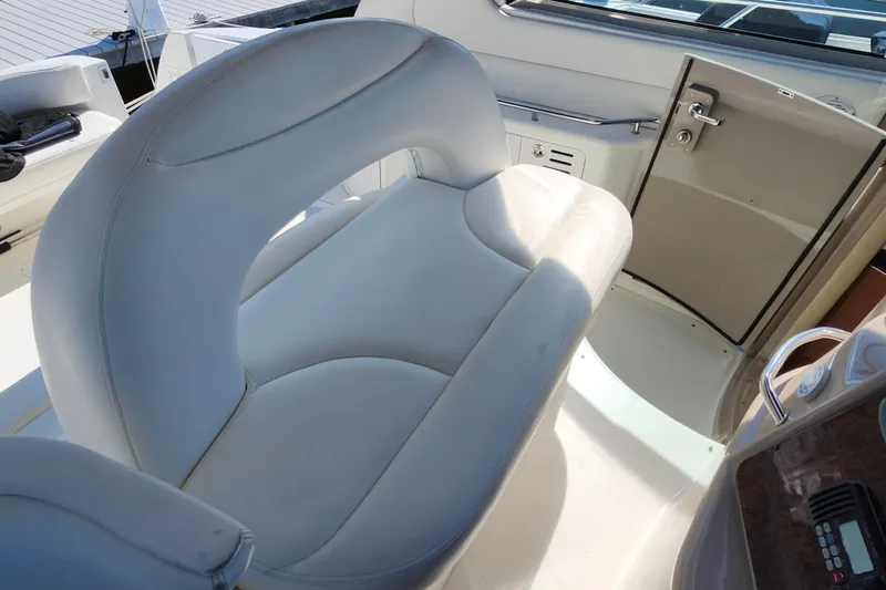  Yacht Photos Pics Luxurious seating on 2002 Sea Ray 410 Sundancer yacht, featuring sleek white upholstery.