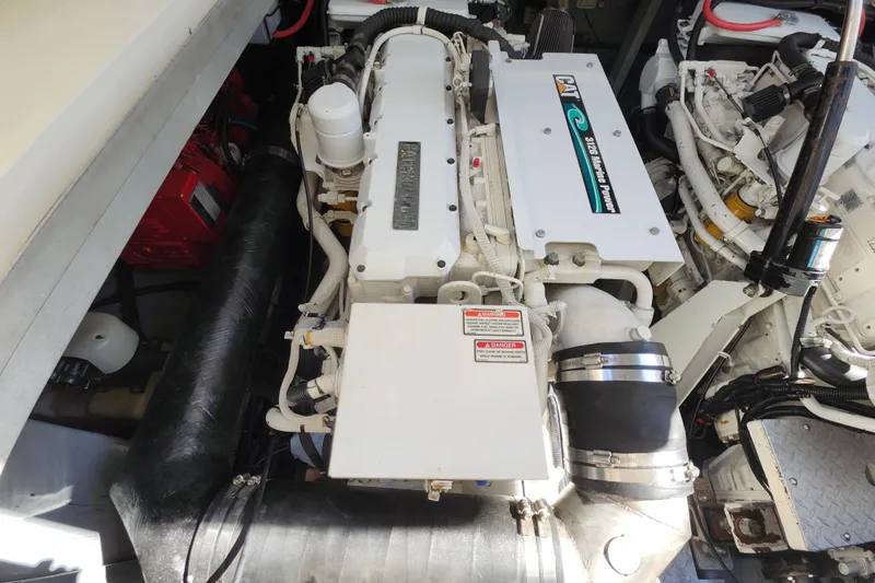  Yacht Photos Pics Engine compartment of a 2002 Sea Ray 410 Sundancer, featuring a CAT marine engine.