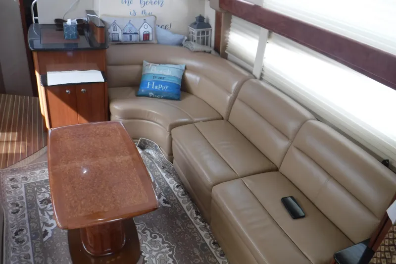 Yacht Photos Pics Luxurious interior of a 2007 Meridian 341 Sedan yacht with leather seating and elegant decor.