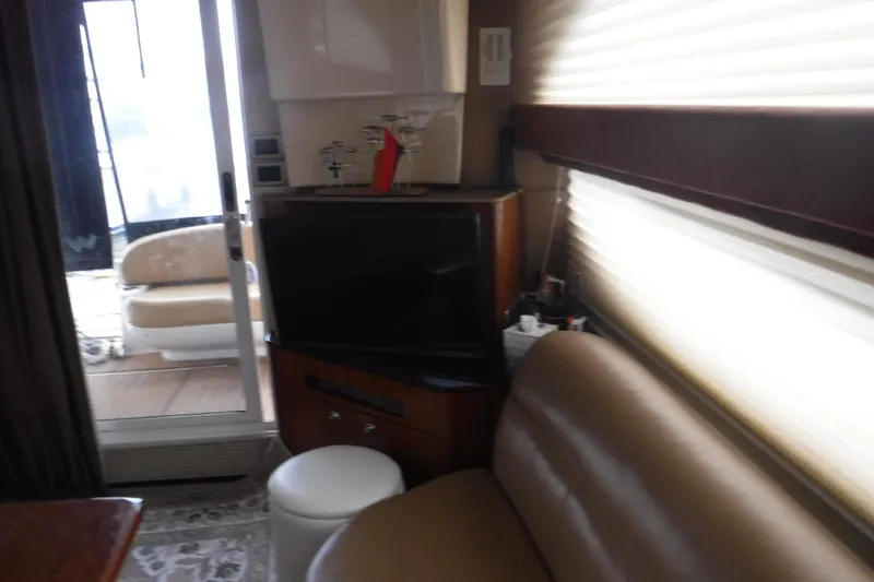  Yacht Photos Pics Interior of 2007 Meridian 341 Sedan yacht with seating and entertainment area.