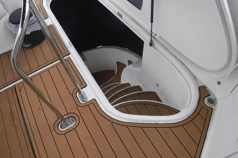  Yacht Photos Pics Staircase on 2007 Meridian 341 Sedan yacht with teak flooring and stainless steel railing.