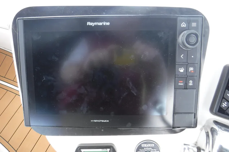  Yacht Photos Pics Raymarine HybridTouch display on 2007 Meridian 341 Sedan yacht dashboard.