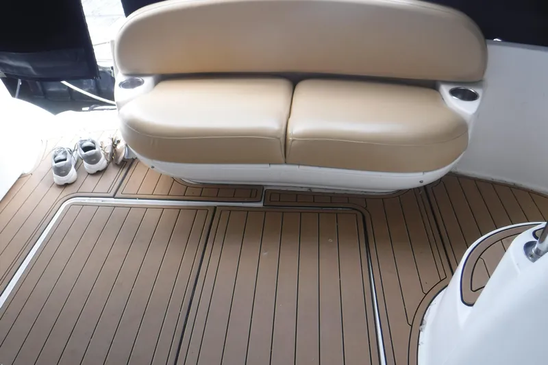  Yacht Photos Pics 2007 Meridian 341 Sedan interior with tan seating and wooden flooring.