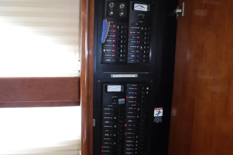  Yacht Photos Pics Electrical panel inside a 2007 Meridian 341 Sedan yacht, featuring various switches and gauges.