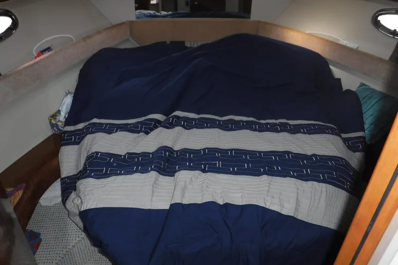  Yacht Photos Pics Cozy cabin bed in 2007 Meridian 341 Sedan yacht interior.