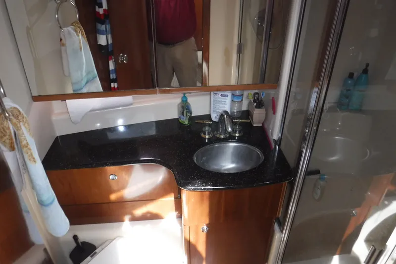  Yacht Photos Pics Bathroom interior of 2007 Meridian 341 Sedan yacht with sink and shower.
