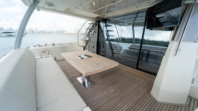 Yachtooma Yacht Photos Pics Luxurious 2017 Present Yachts 680 deck with seating, table, and ocean view.