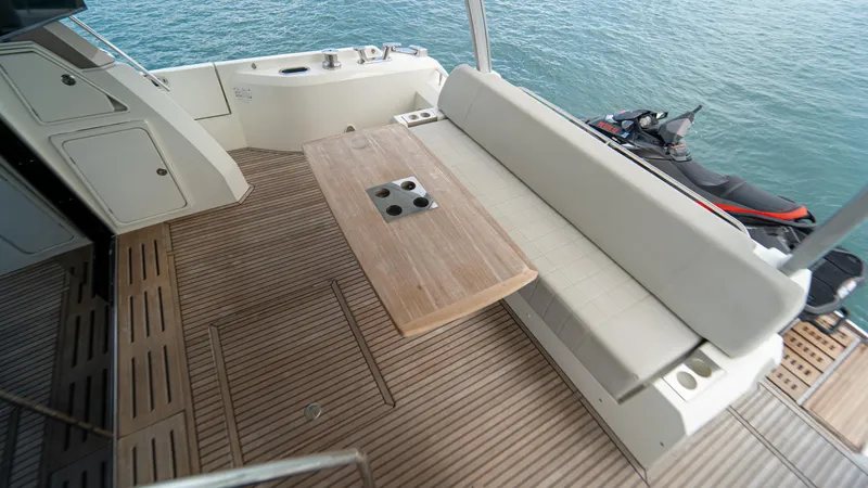 Yachtooma Yacht Photos Pics Luxury yacht deck with seating and table, Present Yachts 680, 2017 model.