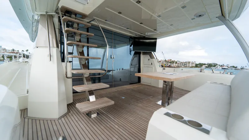 Yachtooma Yacht Photos Pics Luxurious 2017 Present Yachts 680 with modern deck, seating, and staircase.