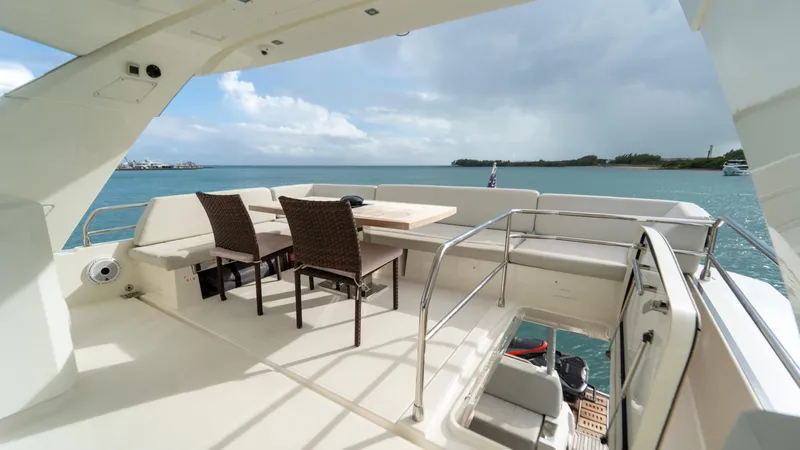 Yachtooma Yacht Photos Pics Luxurious 2017 Present Yachts 680 deck with seating, overlooking serene ocean view.