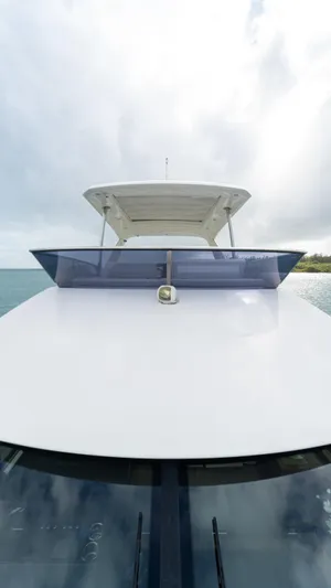 Yachtooma Yacht Photos Pics Present Yachts 680, 2017 model, sleek design on open water.