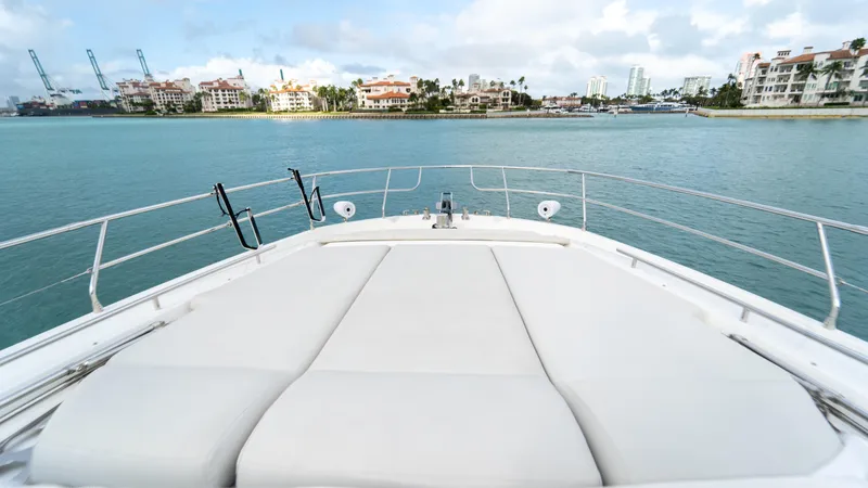 Yachtooma Yacht Photos Pics Luxurious 2017 Present Yachts 680 with spacious deck, overlooking serene waterfront views.