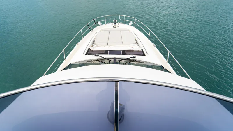 Yachtooma Yacht Photos Pics Aerial view of 2017 Present Yachts 680 on calm water.