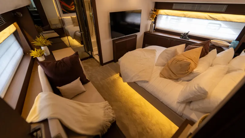 Yachtooma Yacht Photos Pics Luxurious interior of 2017 Present Yachts 680, featuring cozy seating and elegant decor.