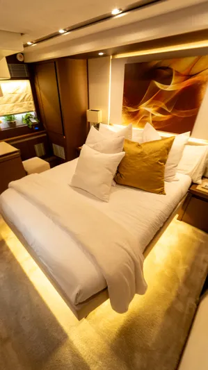 Yachtooma Yacht Photos Pics Luxurious bedroom interior of 2017 Present Yachts 680 with elegant decor and ambient lighting.