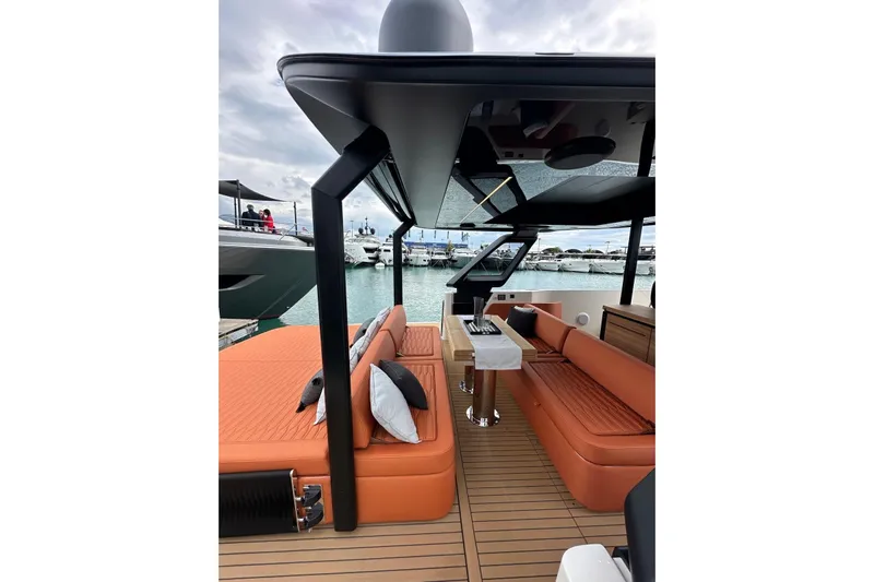 Yacht Photos Pics 2025 Cranchi A46 Luxury Tender with elegant orange seating and modern design.