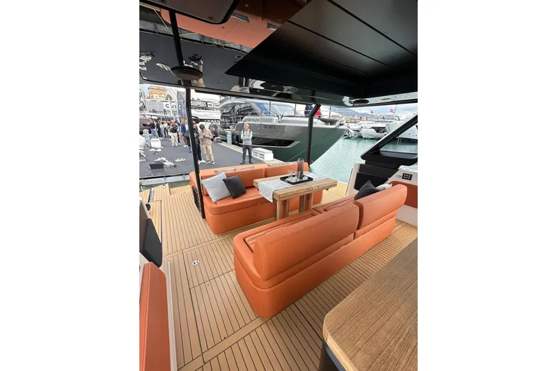  Yacht Photos Pics Luxurious interior of 2025 Cranchi A46 Luxury Tender with elegant seating and modern design.