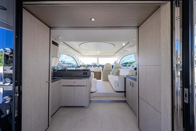Bg 53 Yacht Photos Pics Luxurious interior of 2024 Azimut 53 Fly yacht, featuring modern design and spacious seating.