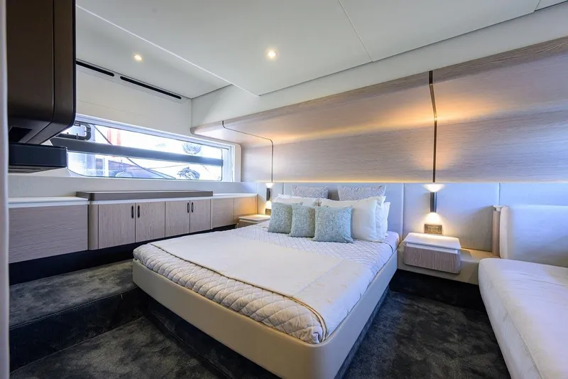Bg 53 Yacht Photos Pics Luxurious bedroom interior of 2024 Azimut 53 Fly yacht with modern design and elegant lighting.