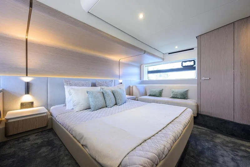 Bg 53 Yacht Photos Pics Luxurious bedroom interior of 2024 Azimut 53 Fly yacht, featuring modern design and elegant furnishings.