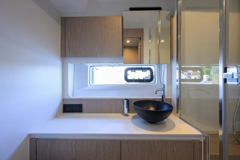 Bg 53 Yacht Photos Pics Luxurious bathroom interior of 2024 Azimut 53 Fly yacht with modern fixtures.