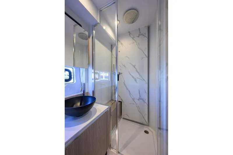 Bg 53 Yacht Photos Pics Luxurious bathroom in 2024 Azimut 53 Fly yacht with modern fixtures and elegant design.