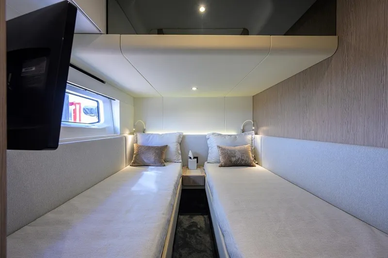 Bg 53 Yacht Photos Pics Luxurious twin cabin interior of 2024 Azimut 53 Fly yacht, featuring modern design and cozy bedding.