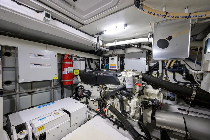 Bg 53 Yacht Photos Pics Engine room of 2024 Azimut 53 Fly yacht, featuring advanced machinery and safety equipment.
