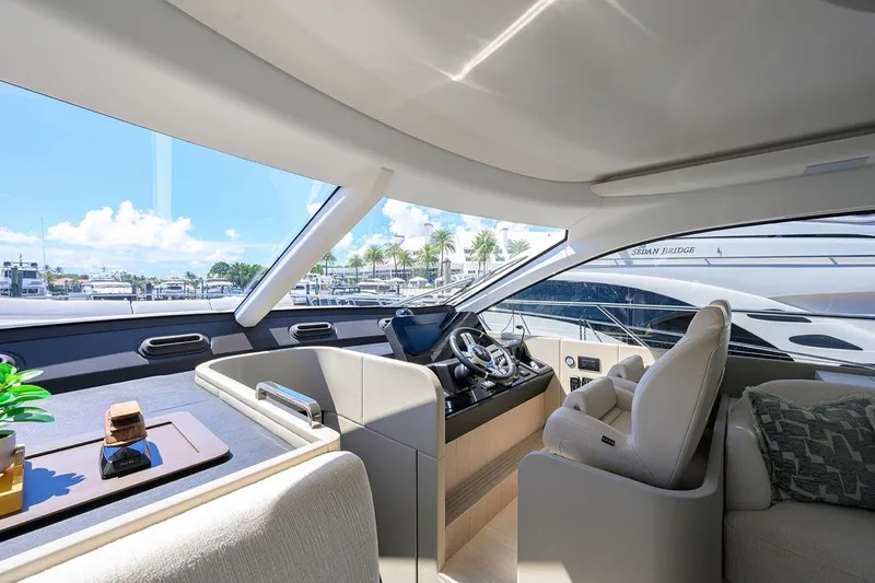 Bg 53 Yacht Photos Pics Luxurious interior of 2024 Azimut 53 Fly yacht with modern helm and panoramic windows.