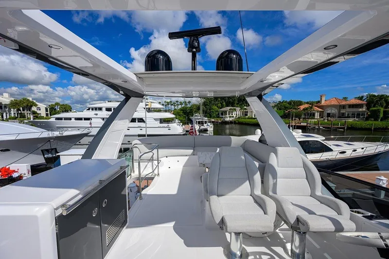 Bg 53 Yacht Photos Pics Luxurious 2024 Azimut 53 Fly yacht interior with modern seating and sleek design.
