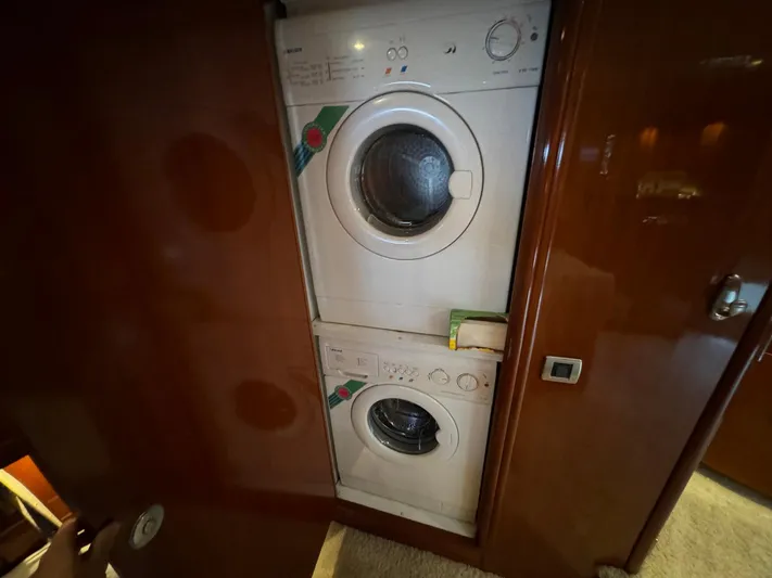Endymion Yacht Photos Pics Stacked washer and dryer inside 2006 Carver 56 Voyager yacht.
