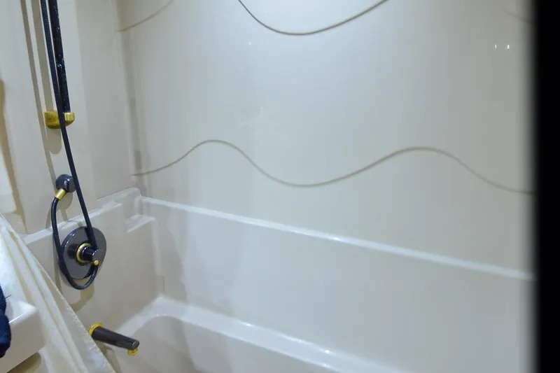 Stage III Yacht Photos Pics Shower area in 2001 Cruisers Yachts 3750 Motoryacht with modern fixtures.