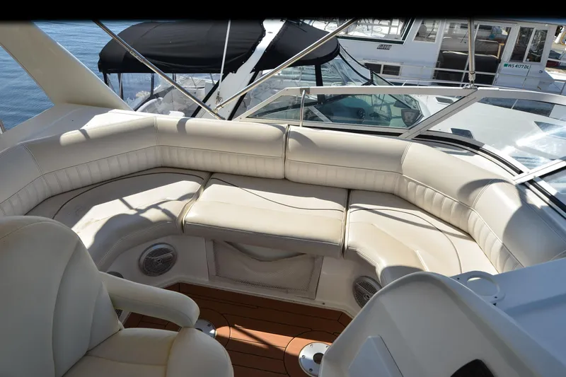 Stage III Yacht Photos Pics Luxurious seating area on 2001 Cruisers Yachts 3750 Motoryacht, featuring plush white upholstery.