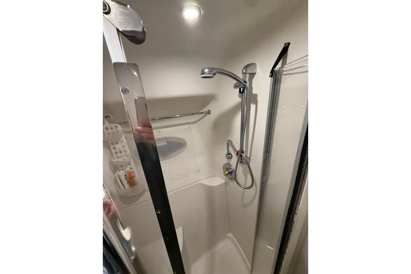 Orion Yacht Photos Pics Shower area in 2004 Carver 460 Voyager yacht, featuring modern fixtures and compact design.