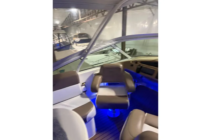 Orion Yacht Photos Pics Interior of 2004 Carver 460 Voyager yacht with modern seating and blue ambient lighting.