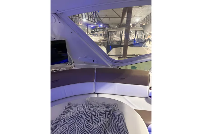 Orion Yacht Photos Pics Interior of 2004 Carver 460 Voyager yacht with plush seating and modern design.