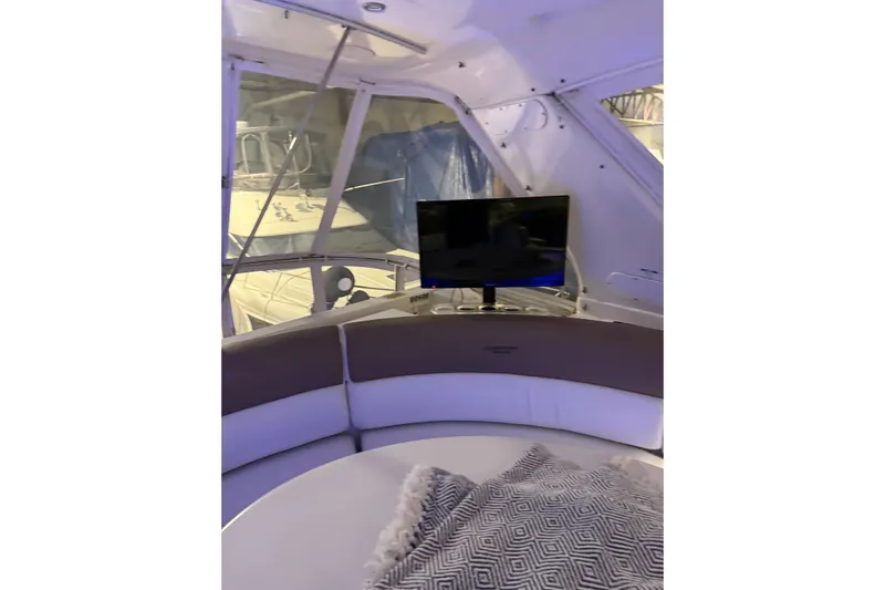 Orion Yacht Photos Pics Interior of 2004 Carver 460 Voyager yacht with TV and seating area.