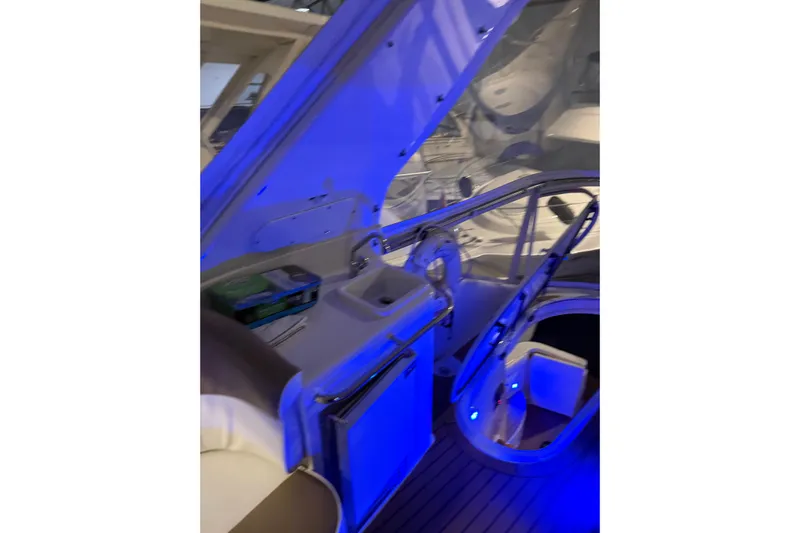 Orion Yacht Photos Pics Interior of 2004 Carver 460 Voyager yacht with blue ambient lighting.
