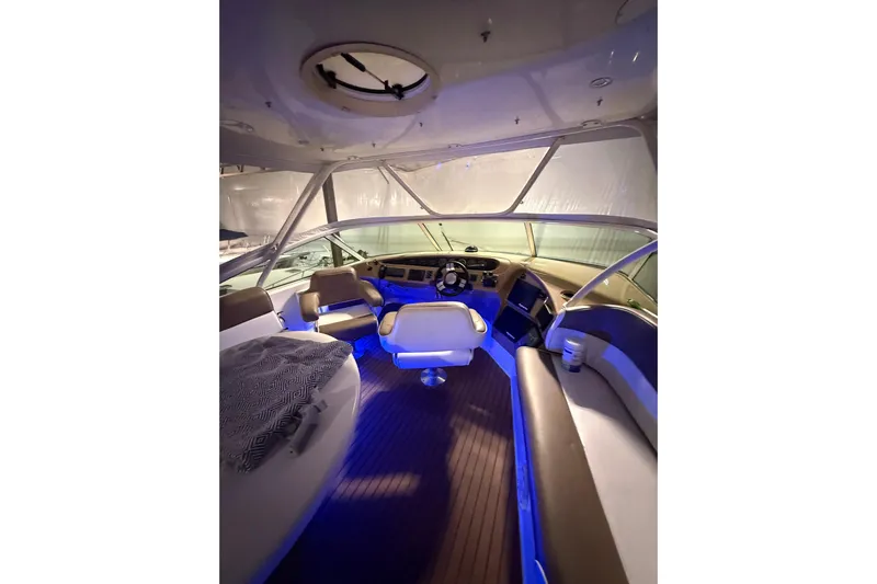 Orion Yacht Photos Pics Interior of 2004 Carver 460 Voyager yacht with modern seating and ambient lighting.