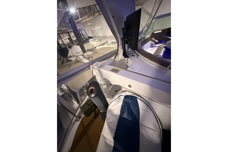 Orion Yacht Photos Pics Interior view of 2004 Carver 460 Voyager yacht with modern seating and equipment.